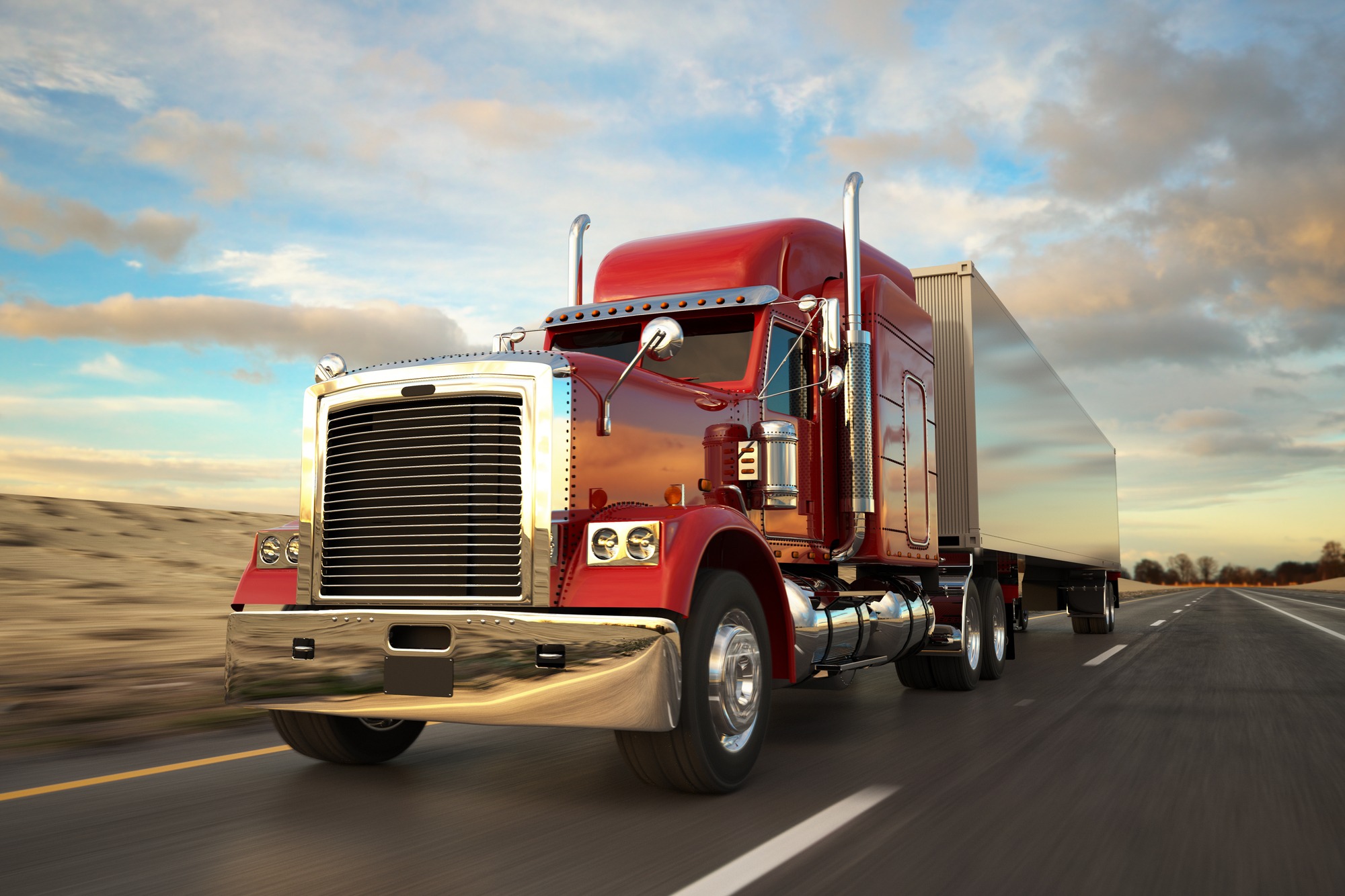 18 Wheel Truck on the road during the day.